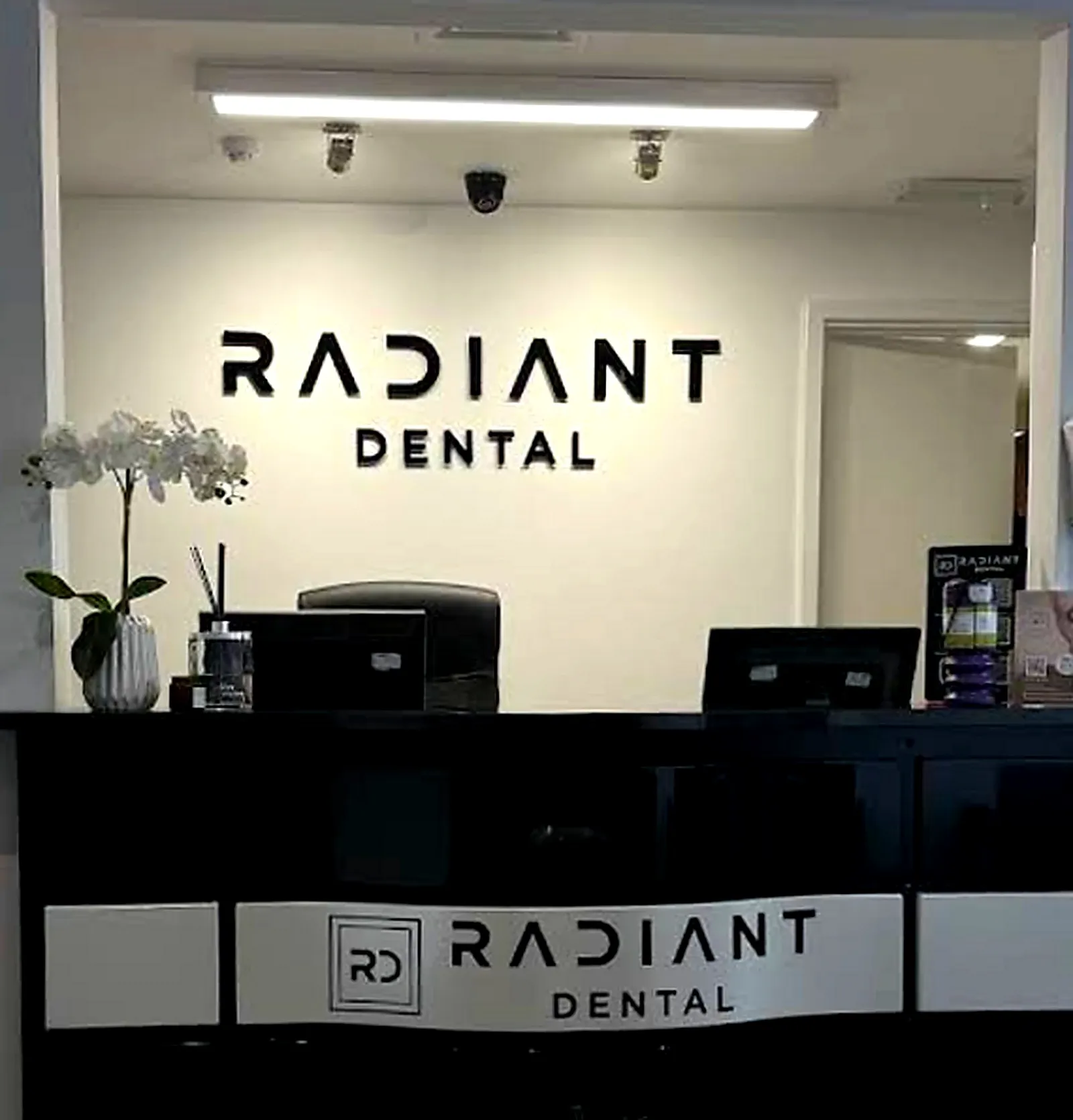 Reception desk and welcoming entrance at Radiant Dental